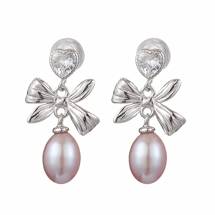 Stříbrné náušnice Mašle s perlou - cca 2